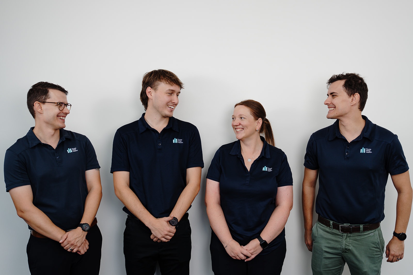 Zac, Jarred, Kylie and Jonathon laughing, left to right, at the clinic